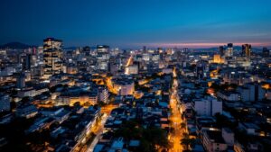Aerial twilight view of Tokyo's urban landscape with illuminated buildings representing the startup ecosystem
